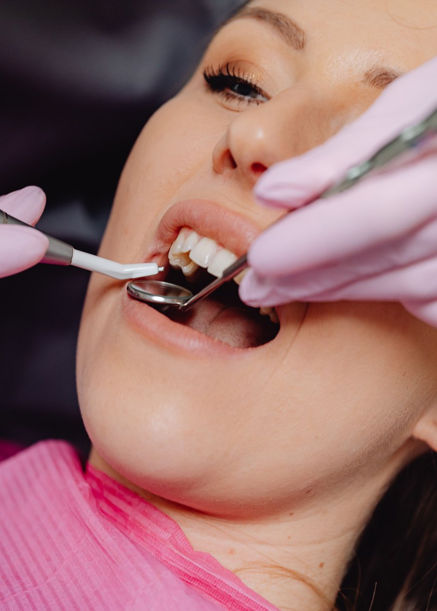 Dentist performing a root canal treatment on a patient
